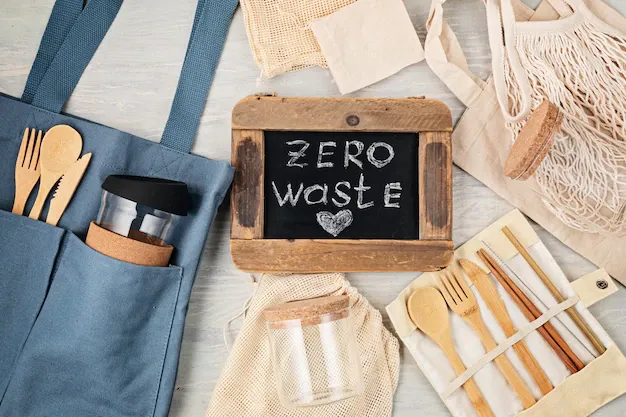 flat-lay-zero-waste-kit-set-eco-friendly-bamboo-cutlery-mesh-cotton-bag-reusable-coffee-tumbler-brushes-water-bottle-sustainable-ethical-plastic-free-lifestyle-top-view_72402-4486.webp