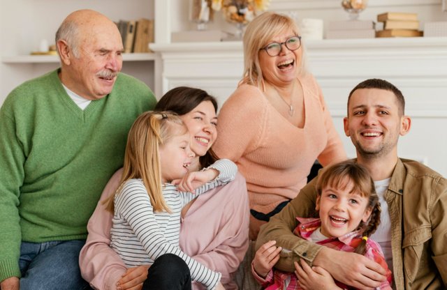 medium-shot-happy-family-indoors.jpg