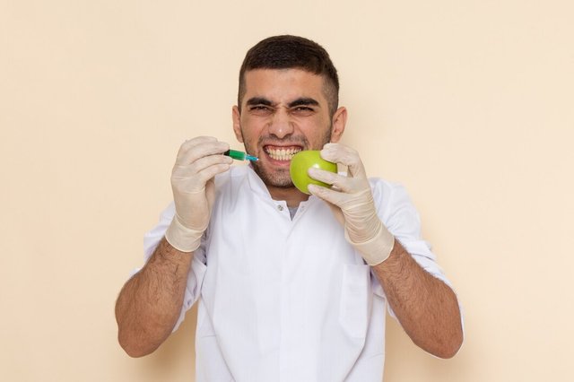 front-view-young-male-white-suit-wearing-gloves-injecting-apple-beige_140725-21384.jpg