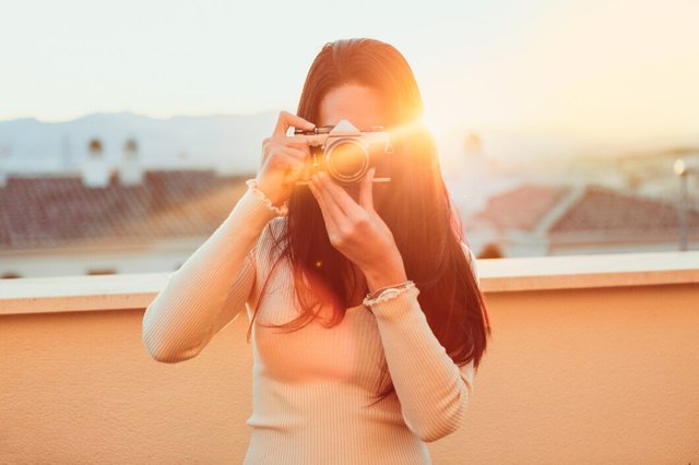 girl-taking-photo-with-her-retro-camera_23-2147601464.jpg