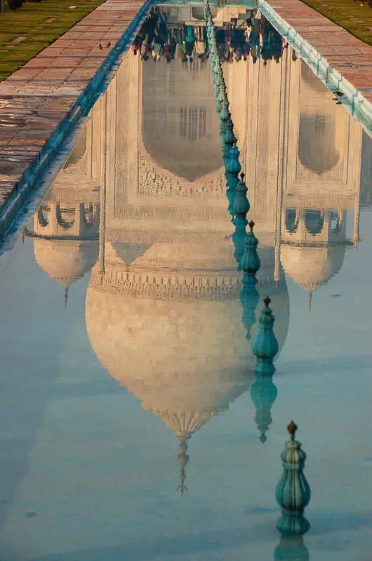 taj-mahal-india-reflecting-pool-portrait.webp