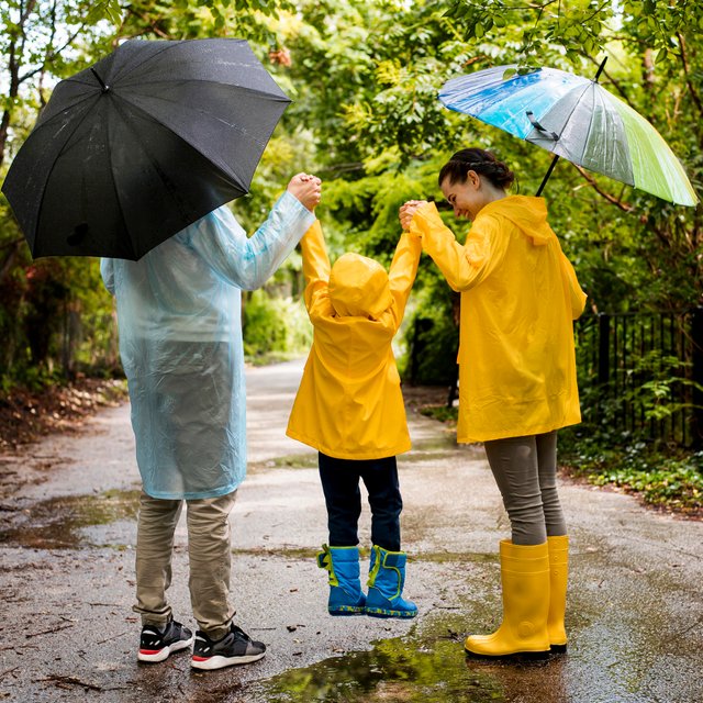 back-view-family-having-fun-while-raining.jpg