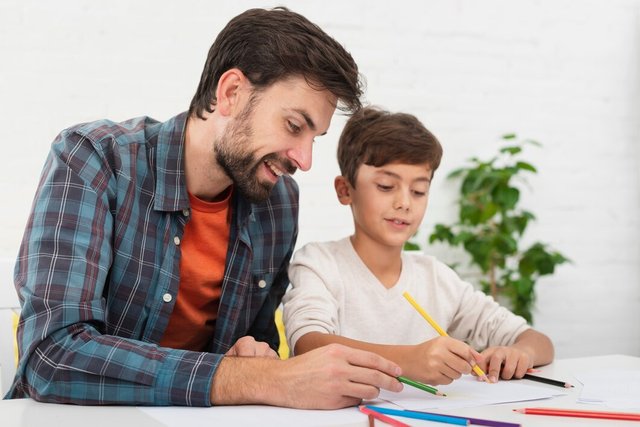 father-helping-little-son-with-homework_23-2148350760.jpg