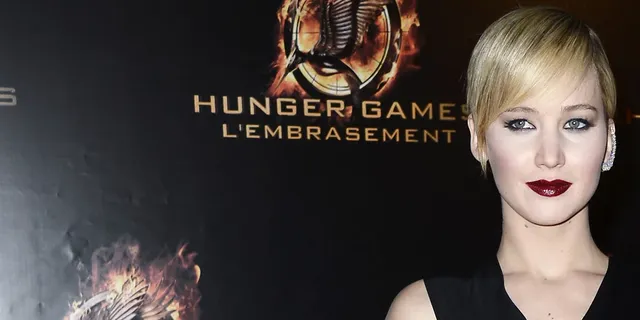 Jennifer-Lawrence-Catching-Fire-Premiere-Paris.webp