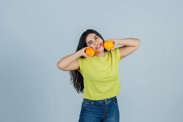 expressive-young-woman-posing-studio_176474-66728.webp