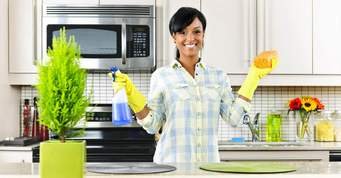 woman cleaning kitchen.jpg