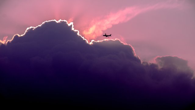 airplane-at-clouds.jpg