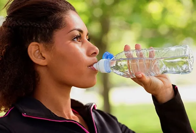 493ss_Thinkstock_rf_woman_drinking_water.webp