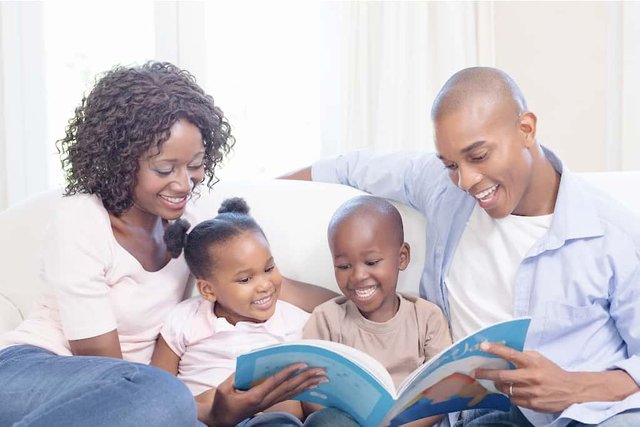 FAMILY-READING-TO-KIDS.jpg