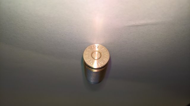 NWT Mint 1 Oz Silver .45cal Bullet Bottom.jpg