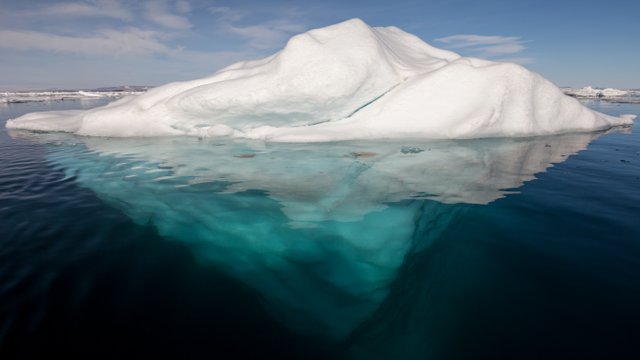 Iceberg_in_the_Arctic_with_its_underside_exposed.jpg