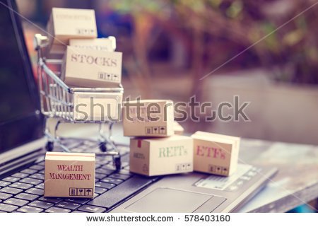 stock-photo-cartons-of-financial-investment-products-in-a-shopping-trolley-on-a-laptop-keyboard-ideas-about-578403160.jpg