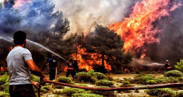 645x344-serious-signs-wildfire-started-deliberately-greek-government-says-1532674933124.jpg