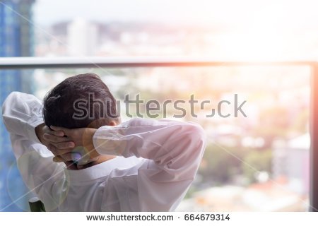 stock-photo-goodfe-and-7a7n-relax-businescs-man-lifestyle-after-work-at-hotel-sitting-hands-behind-head-for-664679314.jpg