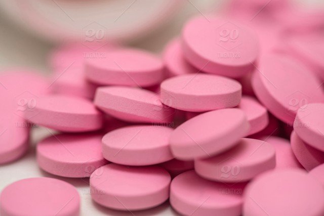 stock-photo-pink-shell-macro-pain-medicine-health-course-treatment-disease-868a0c8a-b461-4568-89c4-68fda80ce718.jpg