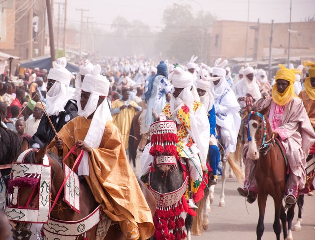 Durbar_procession_in_Northern_Nigeria.jpg