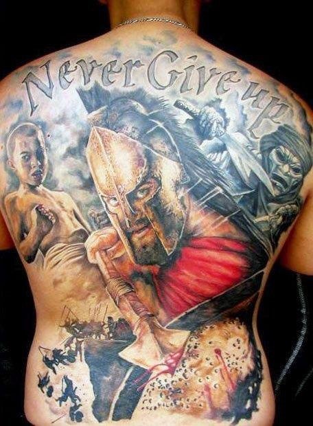never-give-up-guys-tattoo-designs-on-back.jpg