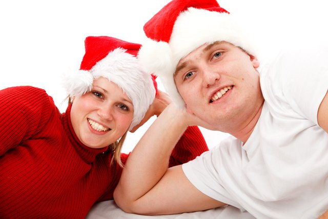 couple-in-santa-hats-11289720309sgi.jpg