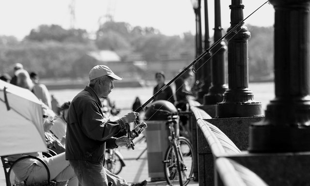Old Man fishing on the pier