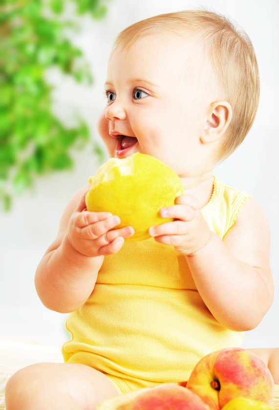 baby-holding-fruit.jpg