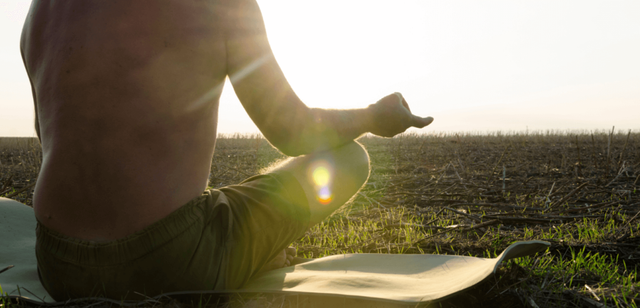 man-meditating-sitting-on-yoga-mat-1024x493-1.png