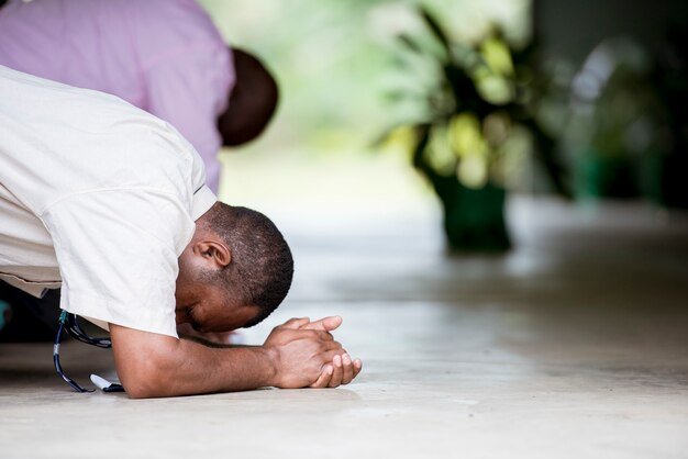 shallow-focus-shot-male-praying_181624-46468.jpg