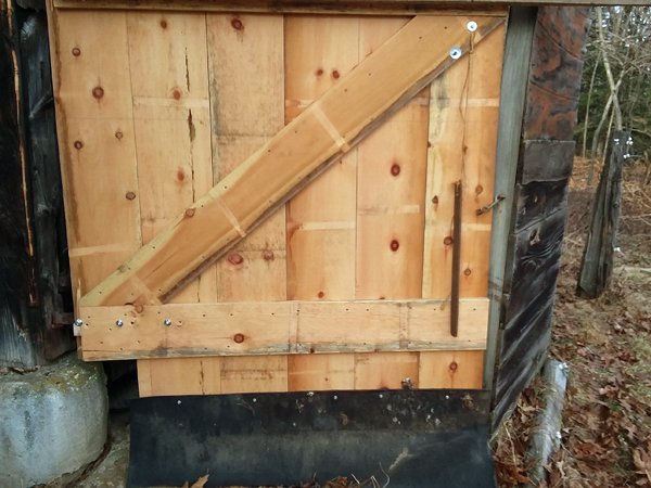Barn doors - 1st one conveyor belt bottom and door latch crop Jan. 2019.jpg