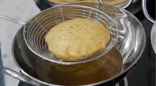 bedhmi puri frying.jpg