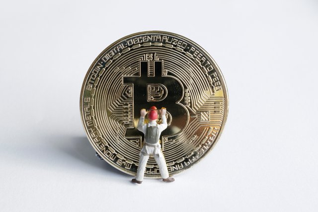 macro-miner-figures-working-bitcoin-virtual-cryptocurrency-mining-concept.jpg