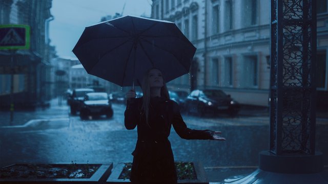 Girl on the street and rain.jpg