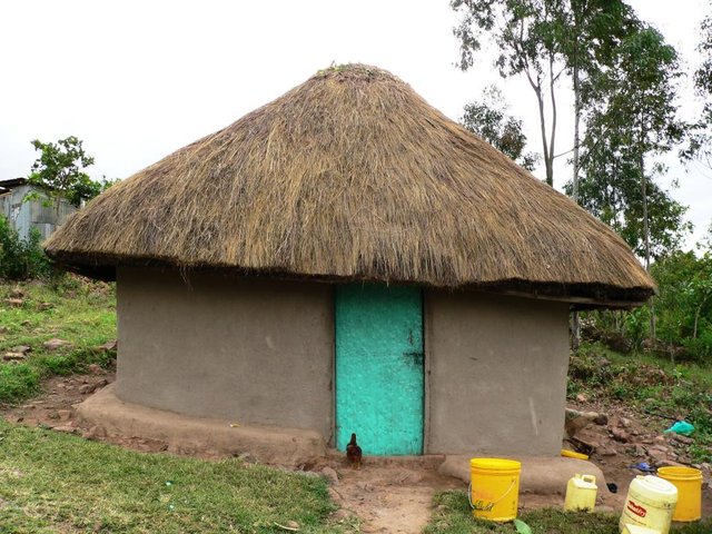 Traditional Luo Home with straw roof.JPG