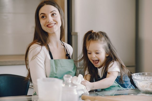 mother-daughter-cook-dough-cookies_1157-34407.jpg