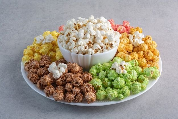 Free photo a large platter of coated pop_.. _ Free Photo #Freepik #freephoto #popcorn #platter #snack #bowl.jpg