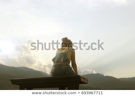 profile-woman-silhouette-watching-sun-450w-693967711.jpg