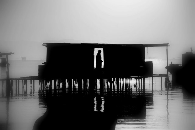 free-photo-of-silhouette-of-a-person-on-a-seaside-pier.jpeg