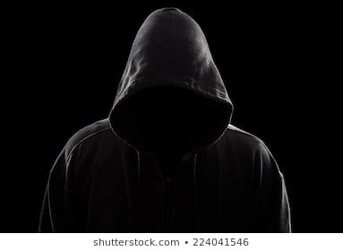 dark-sinister-figure-hood-against-260nw-224041546.jpg