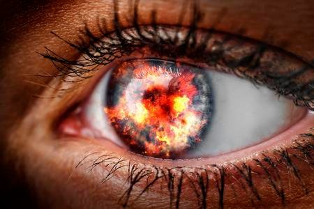 44251299-closeup-of-the-eye-of-a-woman-with-fire.jpg