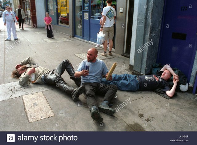 drunken-men-falling-over-rolling-on-the-pavement-drunk-A1K50F.jpg