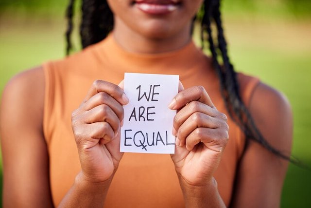 woman-sign-outdoor-gender-equality-with-justice-fight-political-opinion-rally-african-person-paper-activism-protest-park-equal-opportunity-campaign-courage-empowerment_590464-375907 (1).jpg