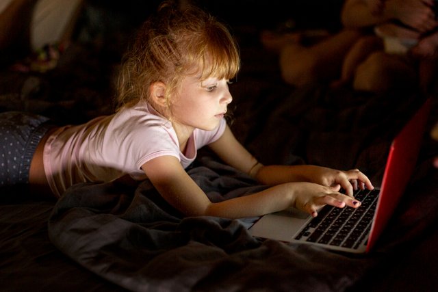 side-view-girl-bed-with-laptop (1).jpg