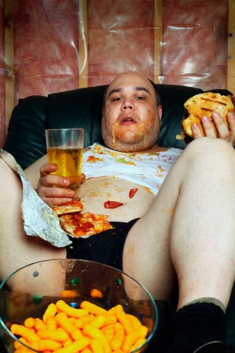 fat-half-naked-slob-scarfing-down-beer-and-snacks.jpg