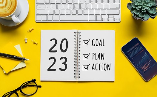 2023-new-year-goal-plan-action-concepts-with-text-on-notepad-and-office-accessories-business(0).jpg