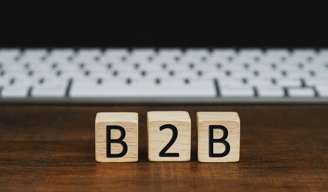 text-b2b-business-business-written-wooden-cubes-front-computer-keyboard-business.jpg