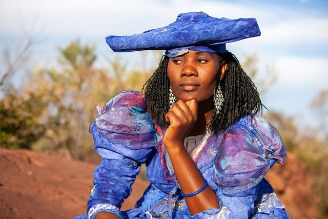 large_herero-woman-wearing-victorian-style-dress-namibia-botswana-shutterstock_1782701507.jpg_f2d2577c01.jpg