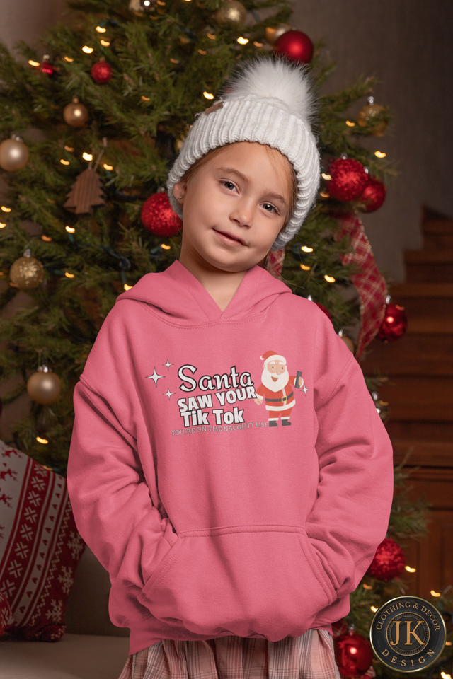 pullover-hoodie-mockup-of-a-girl-in-front-of-a-christmas-tree-30189.png
