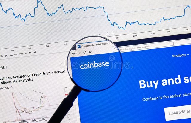 coinbase-cryptocurrency-exchange-site-montreal-canada-april-digital-assets-logo-home-page-laptop-screen-under-magnifying-146048376.jpg