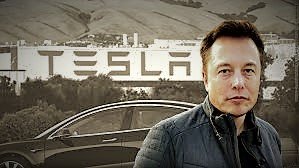 Elon with Tesla backdrop (2).jpg