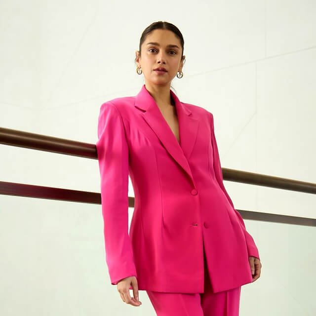 og-aditi-vibrant-pink-pantsuit-nisau-conclave.jpg