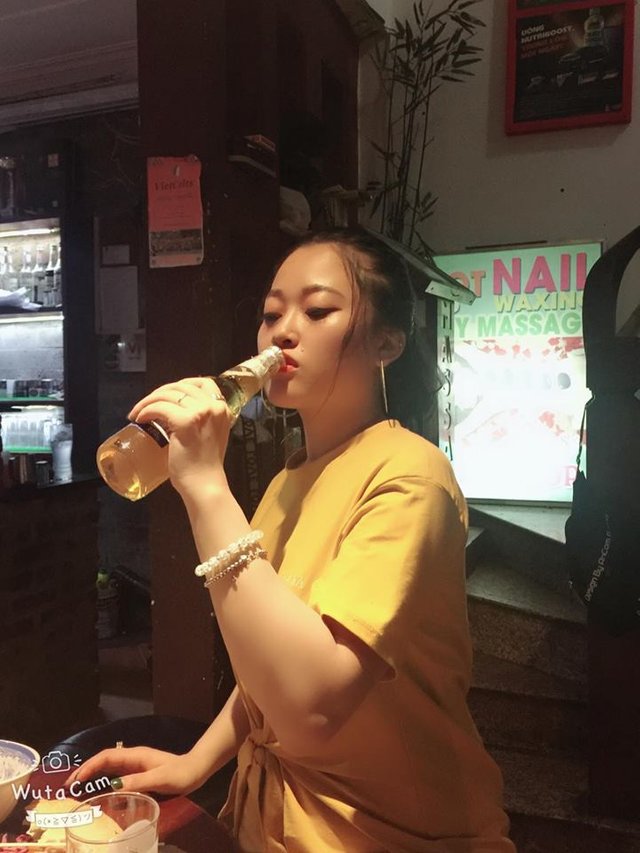 Girl drinking beer ba ba ba 333 tiger saigon vietnam