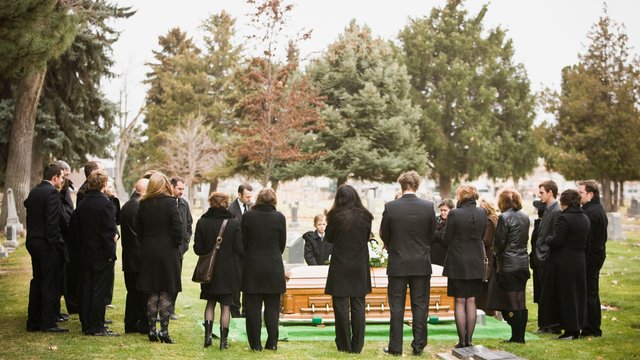 outdoor-shot-of-funeral-104305070-5a57d585b39d030037c2ac41-1.jpg